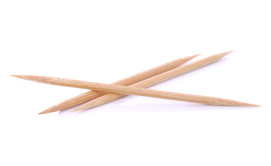 Wooden toothpicks on white background isolate