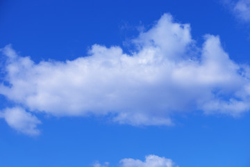 White clouds on blue sky background