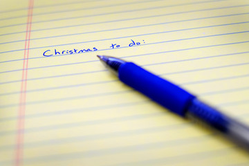 Christmas To Do List Written on Paper with Blue Pen Planning