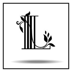 Letter L made with leaves. 