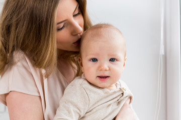 Happy mother with baby child