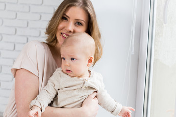 Happy mother with baby child