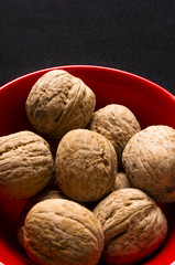 walnuts in red plate