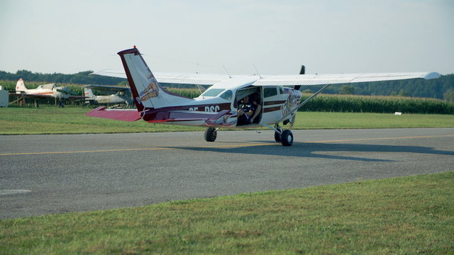 Small plane is taxiing on a runway