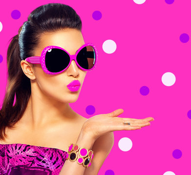 Beauty fashion model girl wearing purple sunglasses