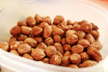 Bowl full of tasty and healthy hazelnuts