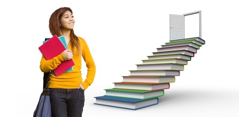 Composite image of female college student with books in park