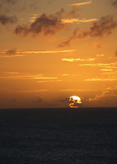 TROPICAL SUNSET OVER SEA