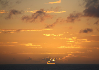 TROPICAL SUNSET OVER SEA