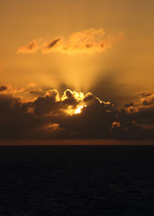 TROPICAL SUNSET OVER SEA
