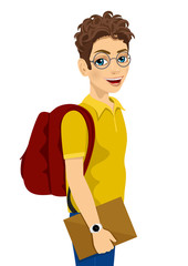 teenage student with glasses and backpack holding textbook