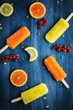 Orange and lemon popsicles, homemade ice cream
