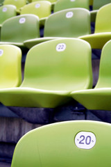 Naklejka na ściany i meble Rows of green chairs in a stadium