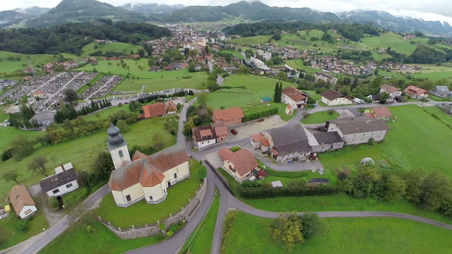 Village with a church on a hill