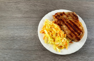 Meat with Vegetables. Healthy Food. Barbeque Steak Dinner