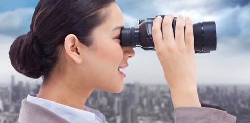 Composite image of side view of a businesswoman