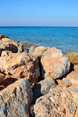Fototapeta na wymiar Rocks on the coast of Aegean Sea.