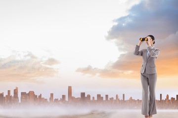 Composite image of portrait of a brunette businesswoman