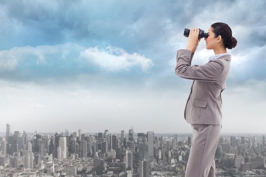 Composite image of portrait of a happy businesswoman - Powered by Adobe