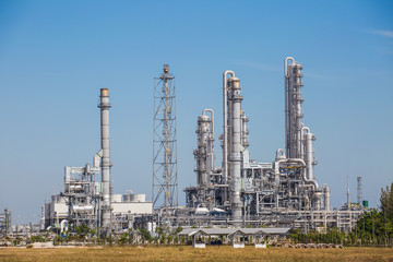 Fototapeta na wymiar Refinery tower fo oil and refinery plant with blue sky - Landscape view
