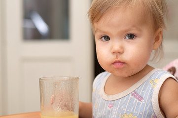 blonde girl eating portrait