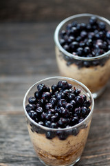 Chia seeds pudding with blueberries in a glass