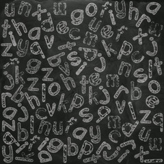 lower case alphabet on black board