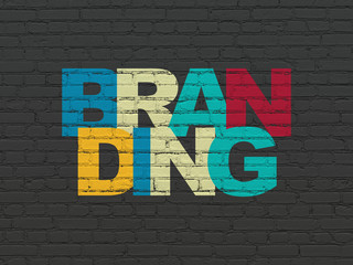 Marketing concept: Branding on wall background