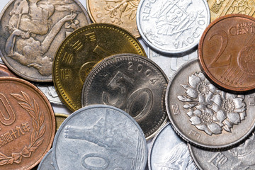 Stacks of coins Japan, Korea, Slovakia and the European Union