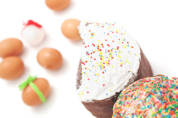 Two Easter and eggs on white background