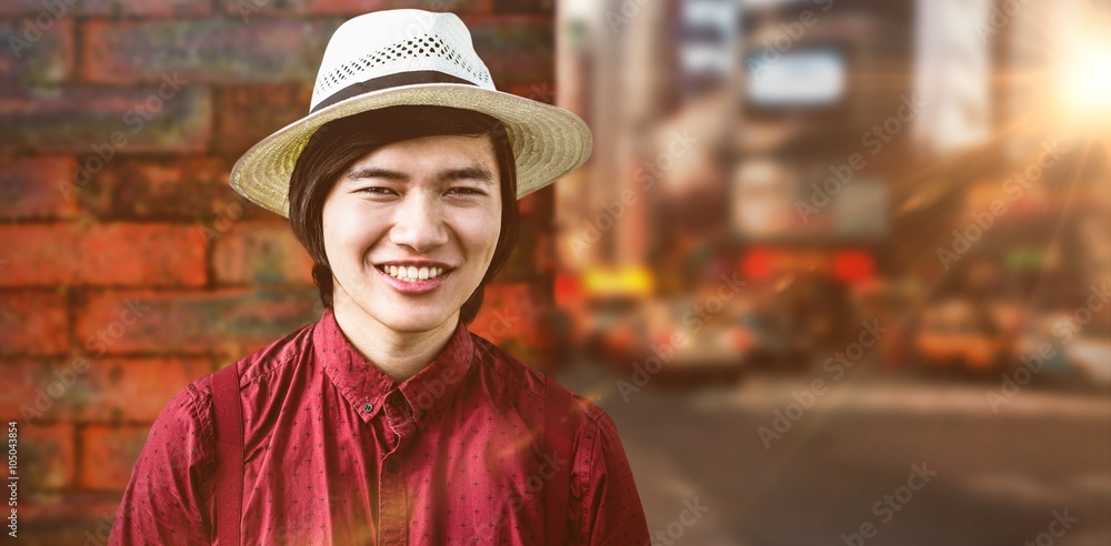 Poster composite image of smiling hipster with a straw hat