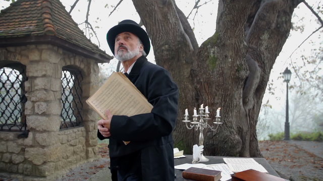 Composers writing table on a beautiful garden 