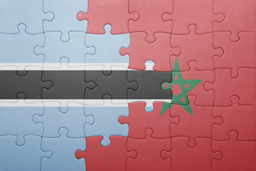 Fototapeta premium puzzle with the national flag of morocco and botswana .