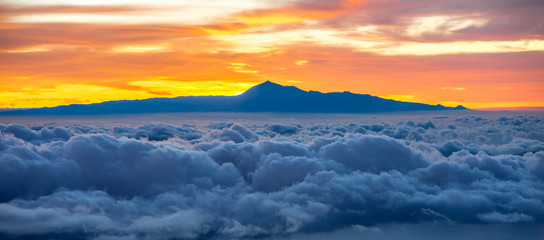 Beautiful cloudscape with Tenerife island on background on the sunrise in Spain