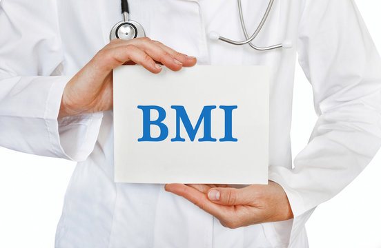 Doctor holding a card with BMI, Body Mass Index sign on white background