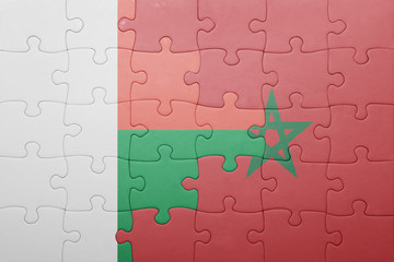 puzzle with the national flag of morocco and madagascar .