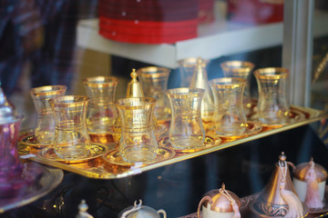 Fototapeta na wymiar Turkish Tea glassy cups on the showcase