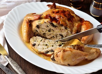 chicken stuffed with meat, mushrooms, spices, herbs, egg