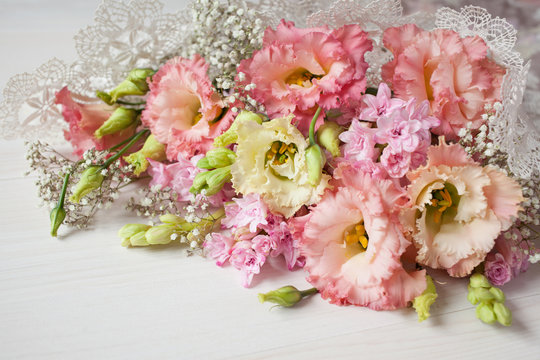 Flowers bouquet of pink hyacinths and lisianthus