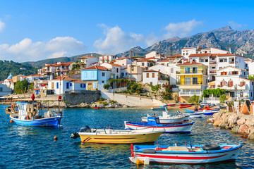 Colorful fishing boats in Kokkari port, Samos island, Greece - obrazy, fototapety, plakaty