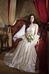 Gorgeous young bride at interior