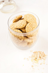 Homemade oatmeal cookies in a glass jar 