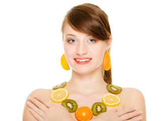 Diet. Girl with necklace of fresh citrus fruits isolated