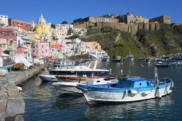 Fototapeta na wymiar View of Marina Corricella and Terra Murata in Procida Island, Italy.