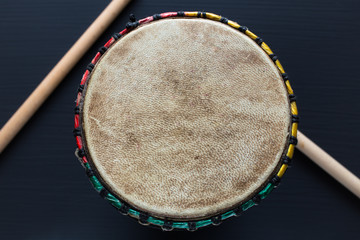 Djembe with drum sticks - Top view