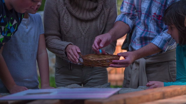 Couple Start The Treasure Hunt With Children