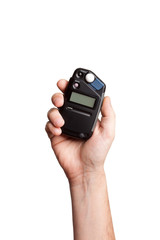 flash meter in hand on white background