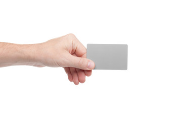 Fototapeta premium gray card in a human hand isolated on white background