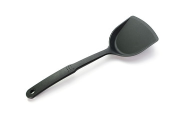 plastic spade of frying pan isolated on white background