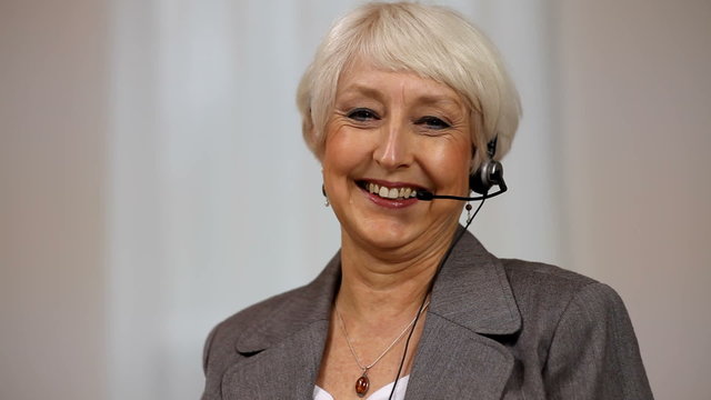 Portrait of Senior Businesswoman with headset